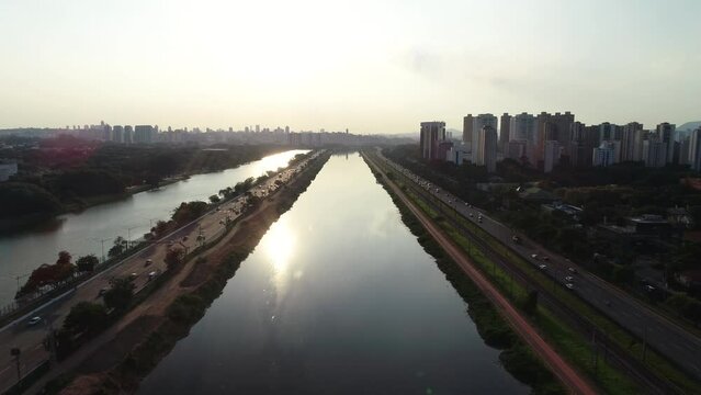 Aerial view of Marginal Pinheiros in S&atilde;o Paulo city, Sunset drone shot, This image is perfect for projects related to events, travel, journalism, real estate