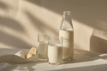  Simple breakfast composition with two glasses of milk, a bottle of milk, and a slice of bread on a table © SHOTPRIME STUDIO