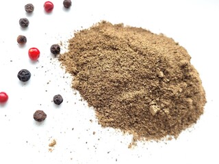 Black pepper powder and little seeds.