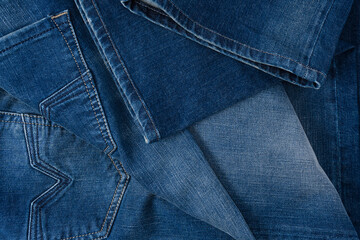 Blue jeans denim texture as a background. Top view.