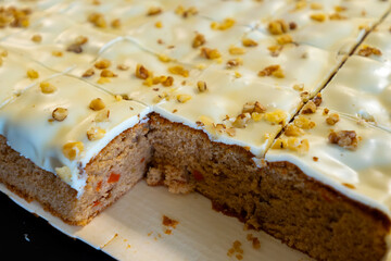 Vegan carrot cake with walnotes in pieces