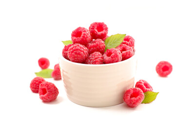 bowl of fresh raspberries fruits isolated on white background