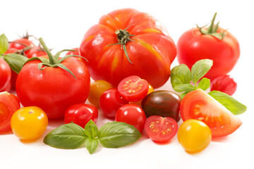 assorted of various tomatoes and basil