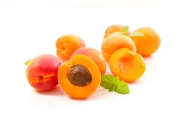  fresh apricots on white background © M.studio