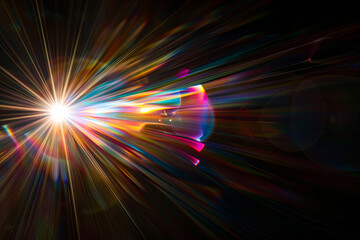 Easy to add lens flare effects for overlay designs or screen blending mode to make high-quality images. Abstract sun burst, digital flare, iridescent glare over black background
