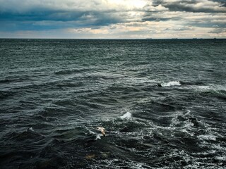 Coastal Majesty: Cloudy Sky Over the Sea
