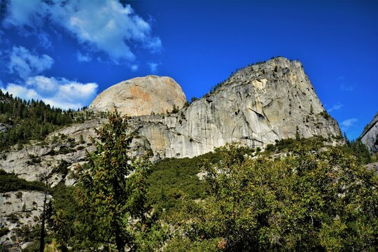Half Dome on the left (in the background) and Mount Broderick on the right (Yosemite National Park, California, United States)