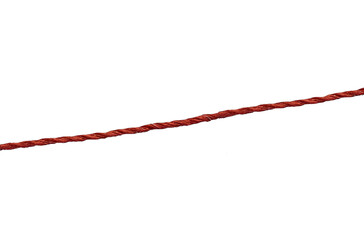 Close-up of red threads on a transparent background