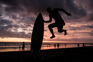 silhouette of a surfer