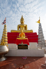 Bangkok, Thailand, February 18, 2024, Wat Khao Din, Golden Buddha Statue in Serene Temple Setting.  Golden Buddha Statue on Red Carpet in Thai Temple