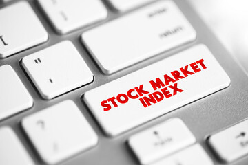 Obraz premium Stock Market Index is an index that measures a stock market, that helps investors compare current stock price levels, text concept button on keyboard