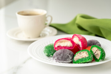 Multi-colored Japanese cakes Mochi in a white plate - 788446723