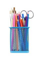 Colored pencils and various school supplies in a metal holder or cup. Isolated from the background	