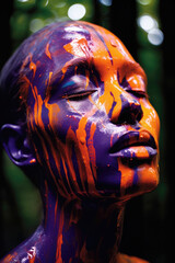 Close-up of a face with purple and orange paint drips, evoking an abstract art piece with a deep focus on texture and color contrast.