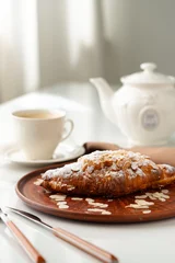  Almond Croissant on clay plate close up © fotofabrika