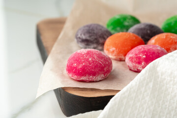 Multi-colored Japanese cakes Mochi in a white plate