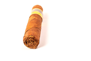 a cigar. on a white background. There is no isolation. close-up. there is a tinting