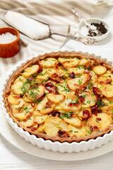 Irish potato pie with bacon in baking dish