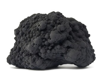 Close-up of a porous black volcanic rock on a white background - obrazy, fototapety, plakaty