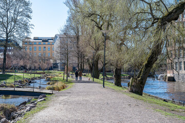 Waterfront park Strömparken during early spring in Norrköping. Norrköping is a historic industrial town in Sweden
