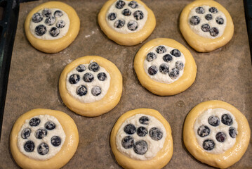 Homemade buns. Bbuns with berries and cottage cheese