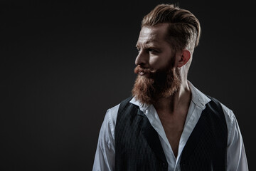 Man with moustache. Barbershop. Brutal elegant man with red beard. Masculine formal menswear....