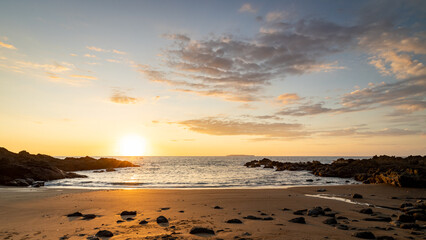 The setting sun on the beach - 788496505