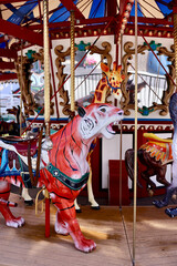 antique carousel with a wild tiger