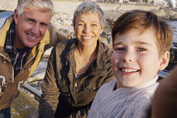 Grandparents, child and portrait selfie on beach or social media post or bonding, profile picture...