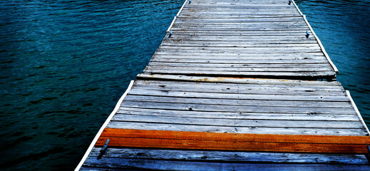 Old Wooden Dock by Water - 788500945