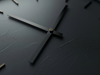 A close up of a black analog clock with gold clock hands.