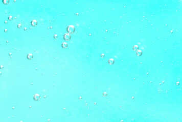 Close up air bubbles on beautiful turquoise background. Macro photo.