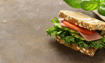 rye bread sandwich with vegetables and ham - 788519722