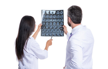 doctor in hospital looking at xray film healthcare, roentgen. medic in medical gown hold xray brain by radiographic. doctor hold xray isolated on white. doctor neurologist with xray scan. MRI images - 788520956