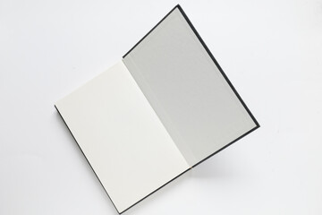 open book on isolated white background, blank pages