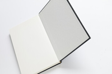 open book on isolated white background, blank pages