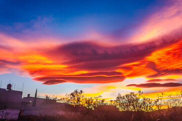 Red and purple lenticular cloud in the Valley of Mexico