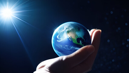 Hand holding planet earth. World Earth Day Concept