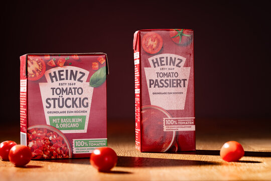 Heinz tomato in pieces sauce and tomato paste for cooking in a studio shot. These are packages that are sold in Germany.