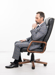 man in suit representing leadership. business leadership and success. businessman leader sit in office chair. business success. professional leader ceo. businessman in office chair isolated on white