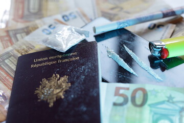 drug powder , passport and banknotes , international drug traffic concept - obrazy, fototapety, plakaty