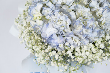 Bouquet of flowers made of hydrangeas and gypsophila