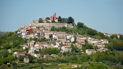 Historic town of Motovun on green hill panoramic view, Istria region of Croatia