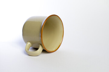 one ceramic empty coffee mug isolated on white background 