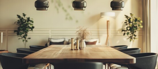 A dining room table and decorations in a modern and contemporary style, with an empty wall for your text, image, or logo.