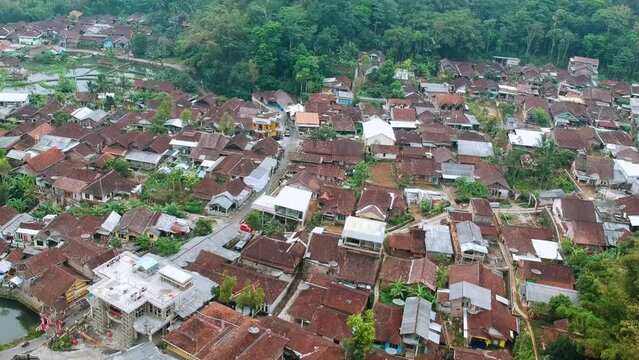 DRONE AERIAL VIEW. a village named Bleder. Location in Ngasinan, Grabag, Magelang, Jawa Tengah, Indonesia. Beautiful village with a lot of green  tree.