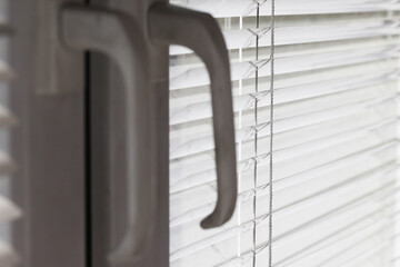 Window blinds texture. Closeup jalousie pattern. Parallel lines background. Diagonal line. Sunlight...