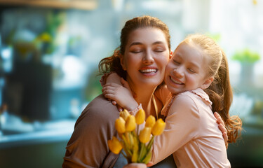 daughter and mom with flowers