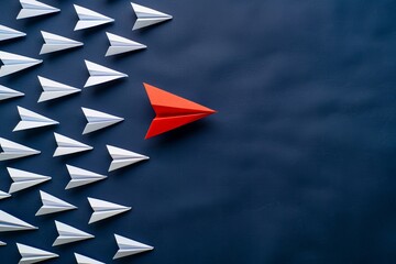 A striking red paper plane leading a formation of white ones against a blue backdrop, symbolizing...