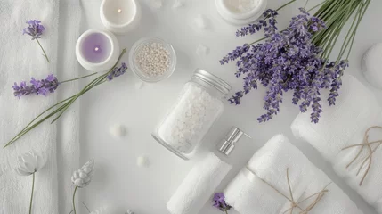 Fotobehang White towels and lavender flowers arranged on a table, perfect for spa or relaxation concept © Fotograf